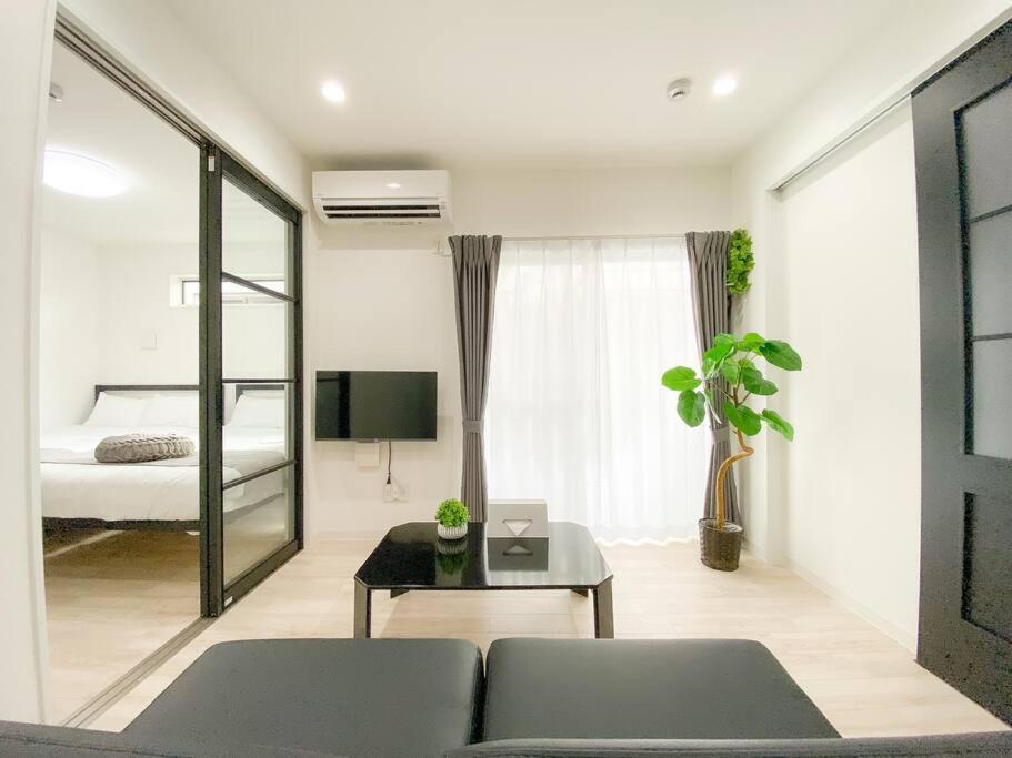 Residential Hotel Glitter Usjまで1駅5分 Osaka Rum bild