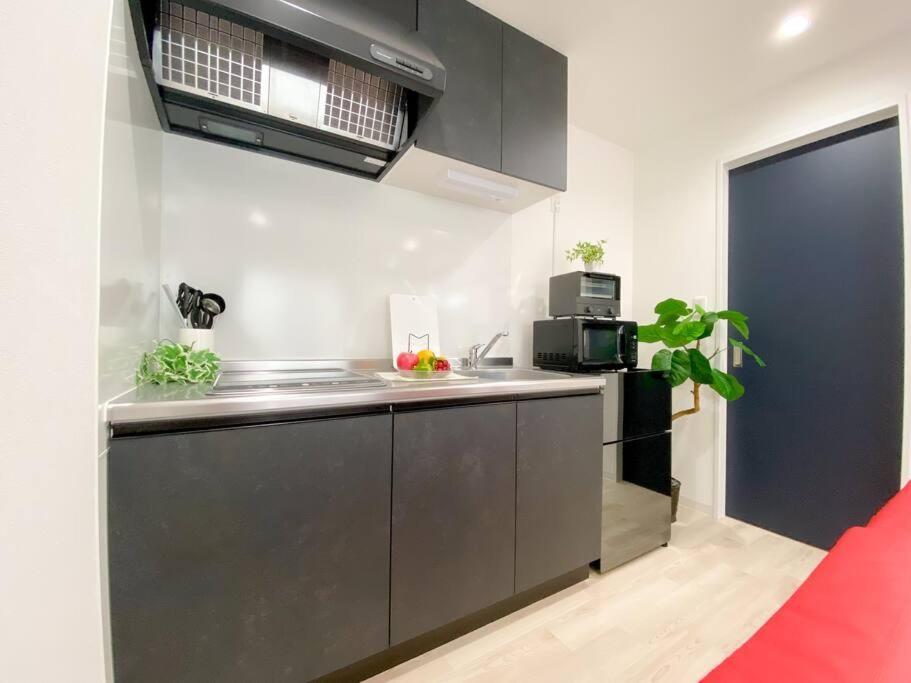 Residential Hotel Glitter Usjまで1駅5分 Osaka Rum bild
