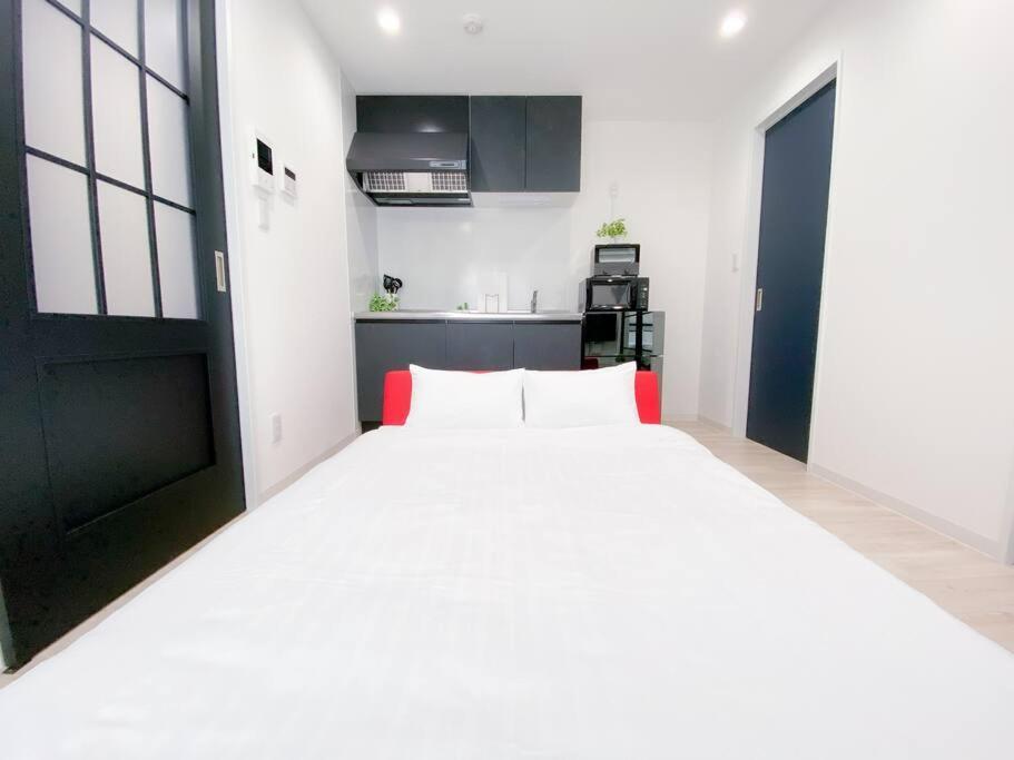 Residential Hotel Glitter Usjまで1駅5分 Osaka Rum bild