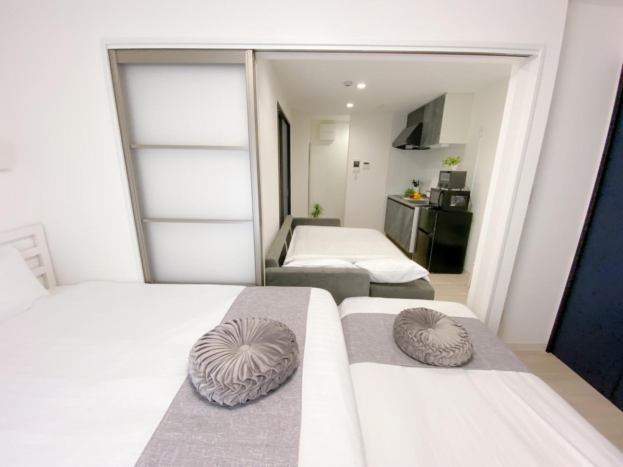 Residential Hotel Glitter Usjまで1駅5分 Osaka Exteriör bild