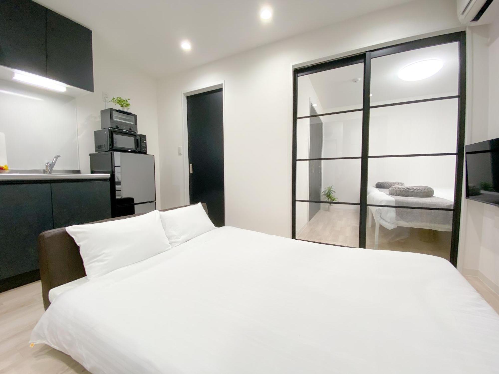 Residential Hotel Glitter Usjまで1駅5分 Osaka Exteriör bild