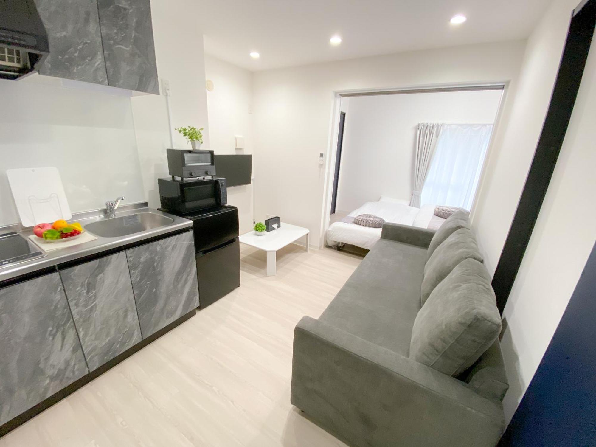 Residential Hotel Glitter Usjまで1駅5分 Osaka Exteriör bild