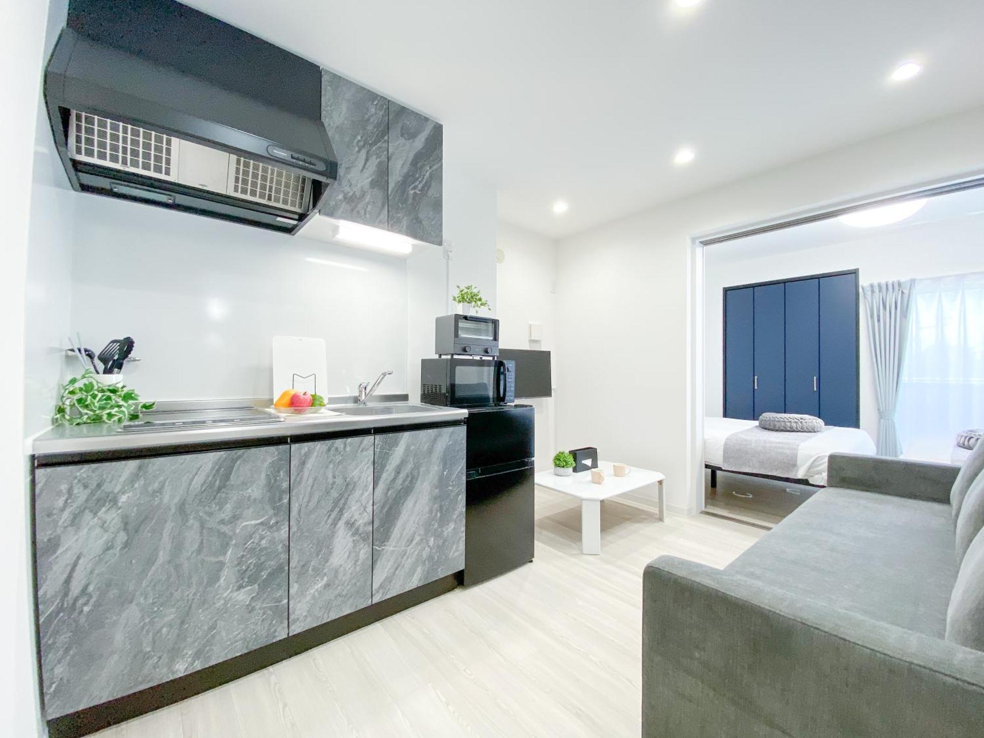 Residential Hotel Glitter Usjまで1駅5分 Osaka Exteriör bild