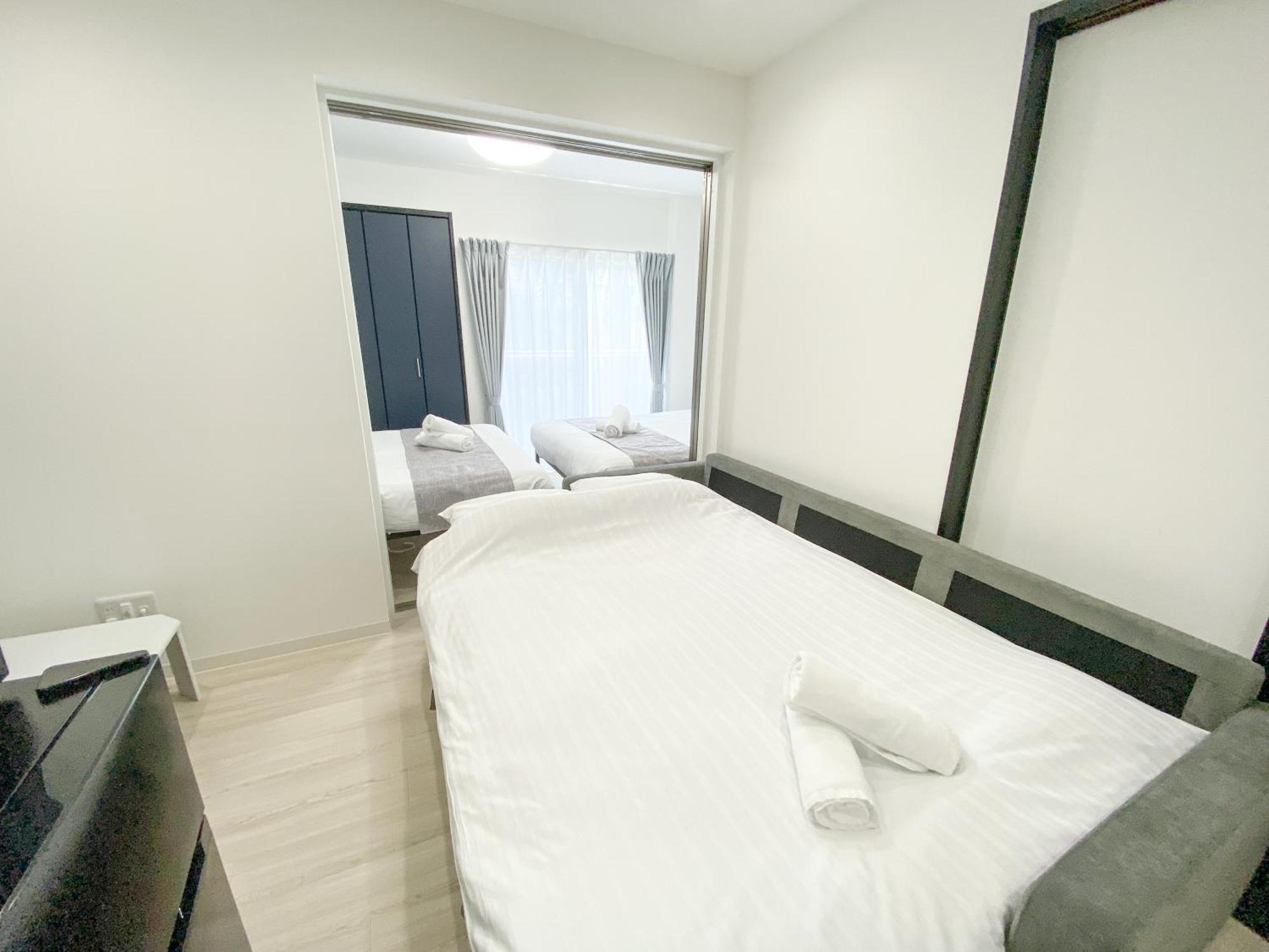 Residential Hotel Glitter Usjまで1駅5分 Osaka Rum bild